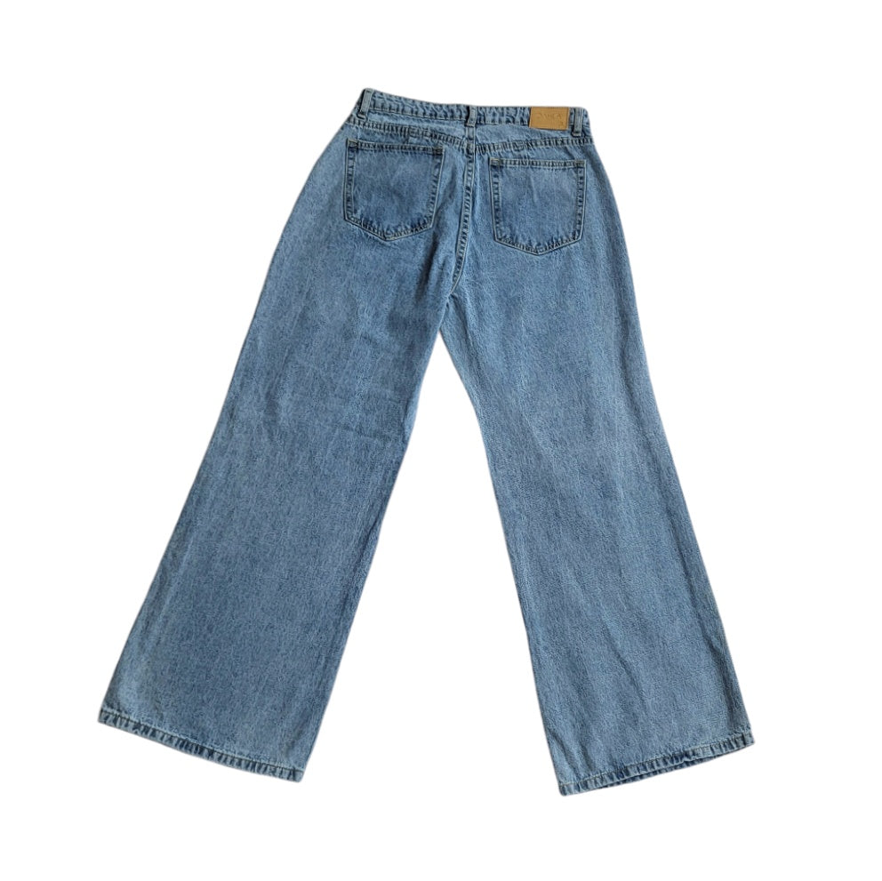 Jean mujer Dahla azul con rotos tiro medio wide leg talla 8