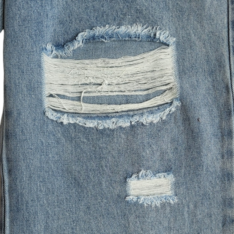 Jean mujer Dahla azul con rotos tiro medio wide leg talla 8