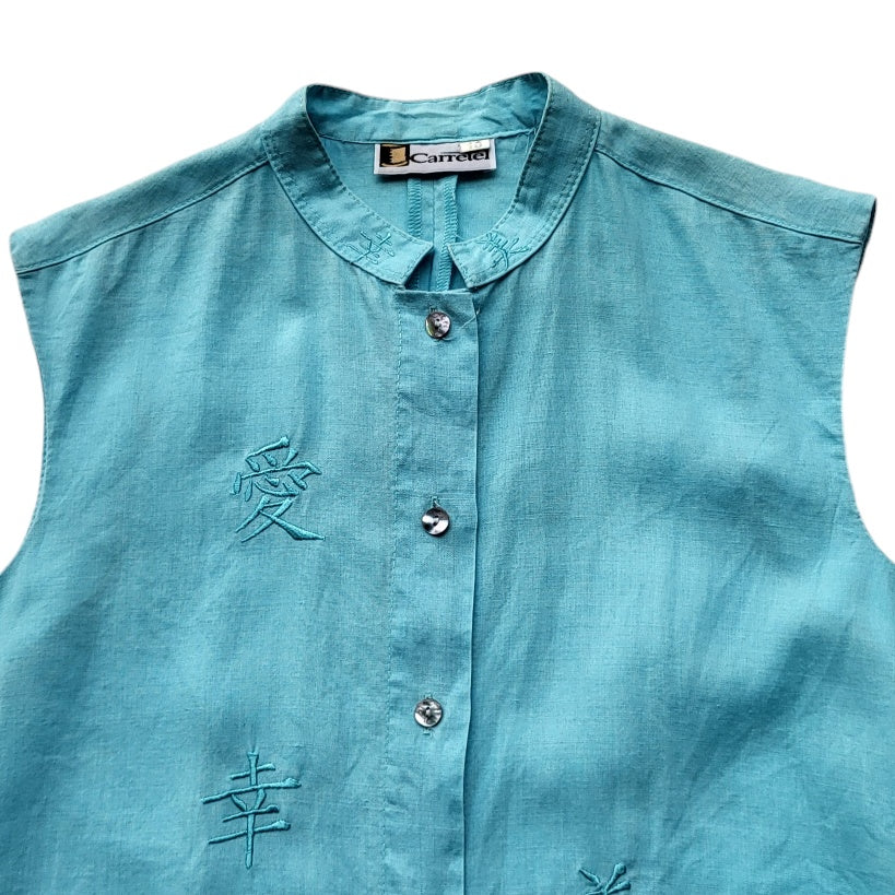 Blusa mujer Carretel Azul con letras chinas bordadas talla 10