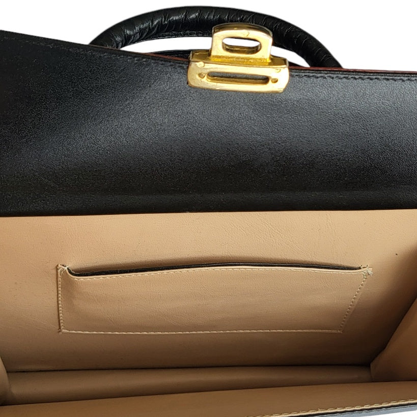 Cartera vintage mujer negra con vinotinto tipo baúl