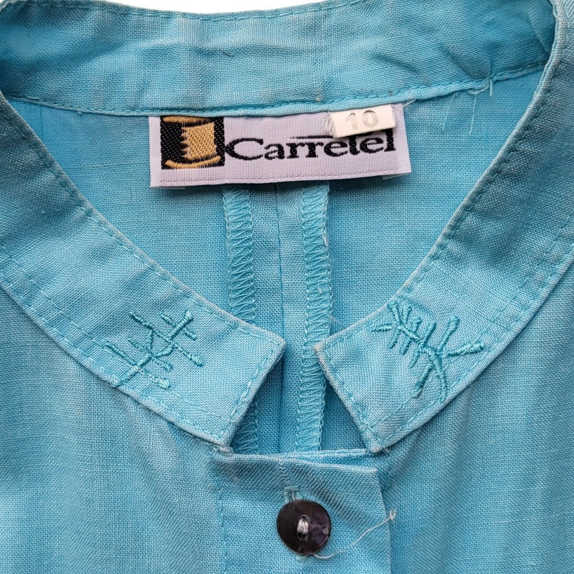 Blusa mujer Carretel  Azul  con letras chinas bordadas talla 10