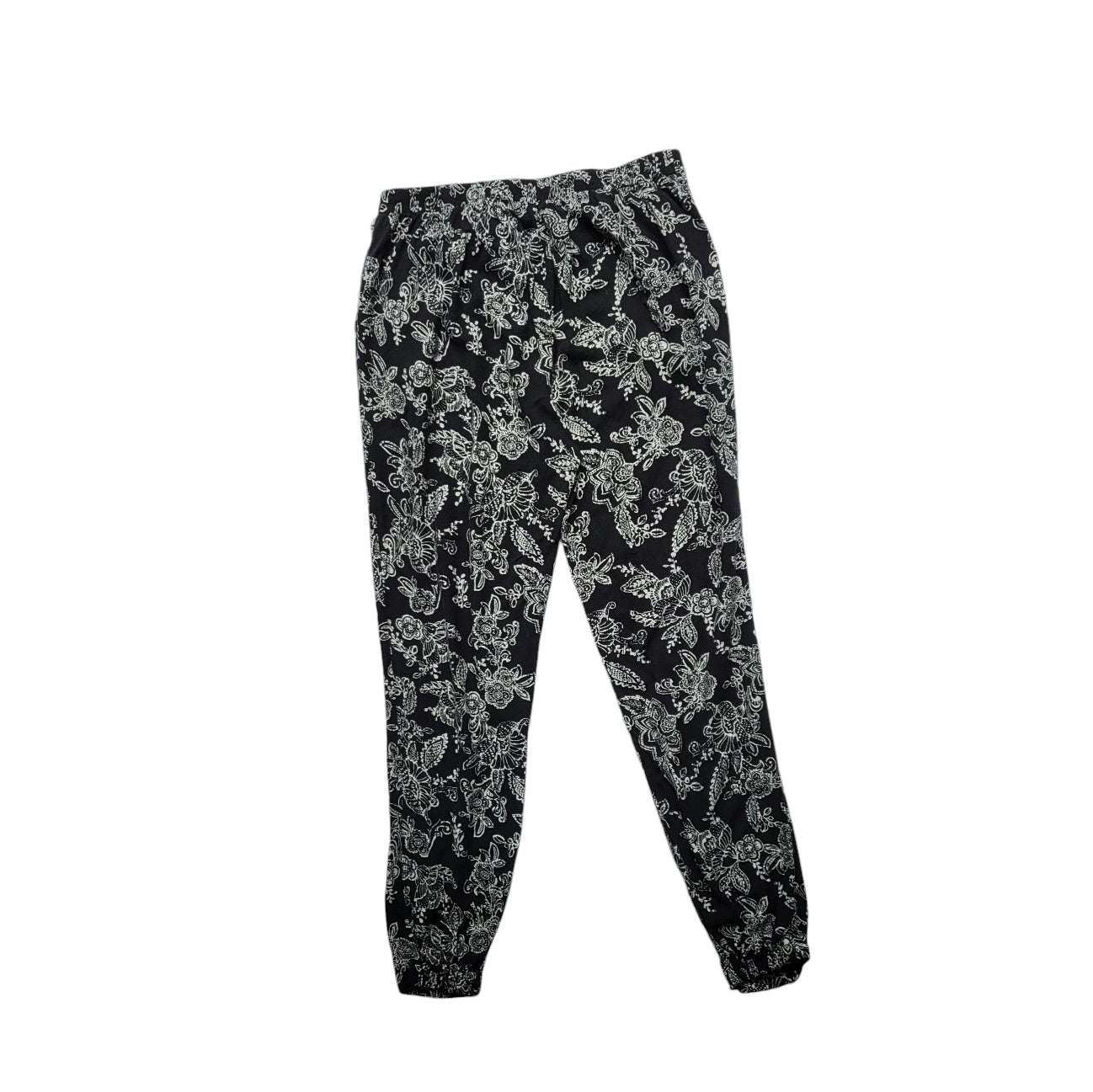 Jogger mujer Sybilla negro con flores blancas talla L