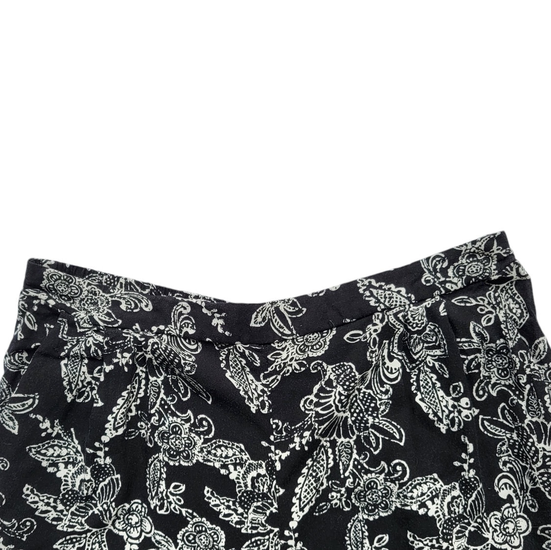 Jogger mujer Sybilla negro con flores blancas talla L